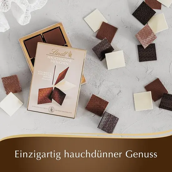 Копирна хартия OIP в КОМПЛЕКТ с шоколад Lindt Hauchdünne Täfelchen - микс от три вида шоколадови плочки