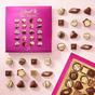 Отворена и затворена кутия мини пралини Lindt 